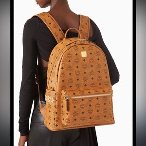 MCM Visetos Stark Side Studded Small-Medium Backpack Unisex cognac Authentic